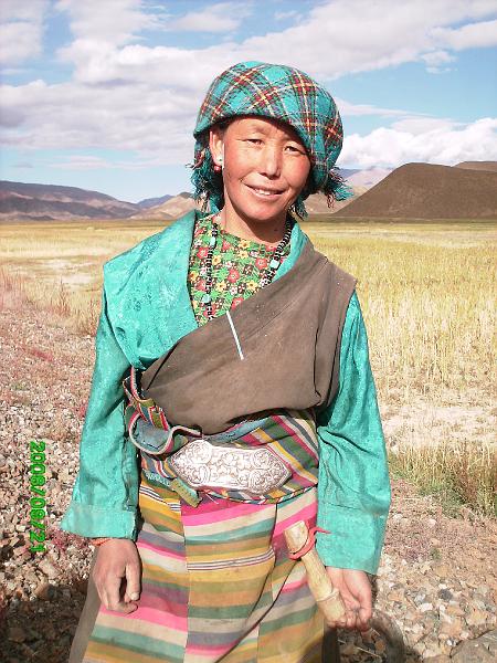 PICT0232.JPG - a young wife and mother tending the herd